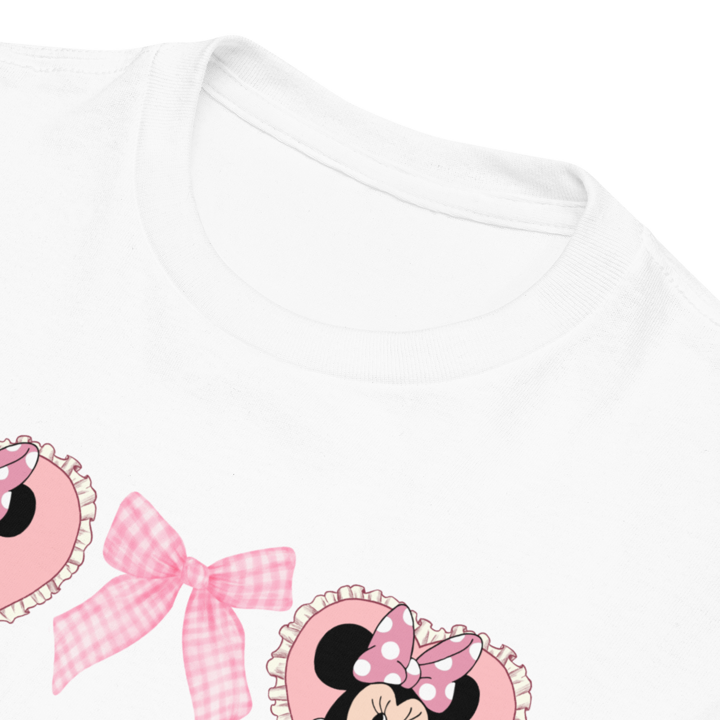Cute pink Minnie Mouse silhouette shirt with heart and bow accents for girls, inspired by the coquette fashion trend.