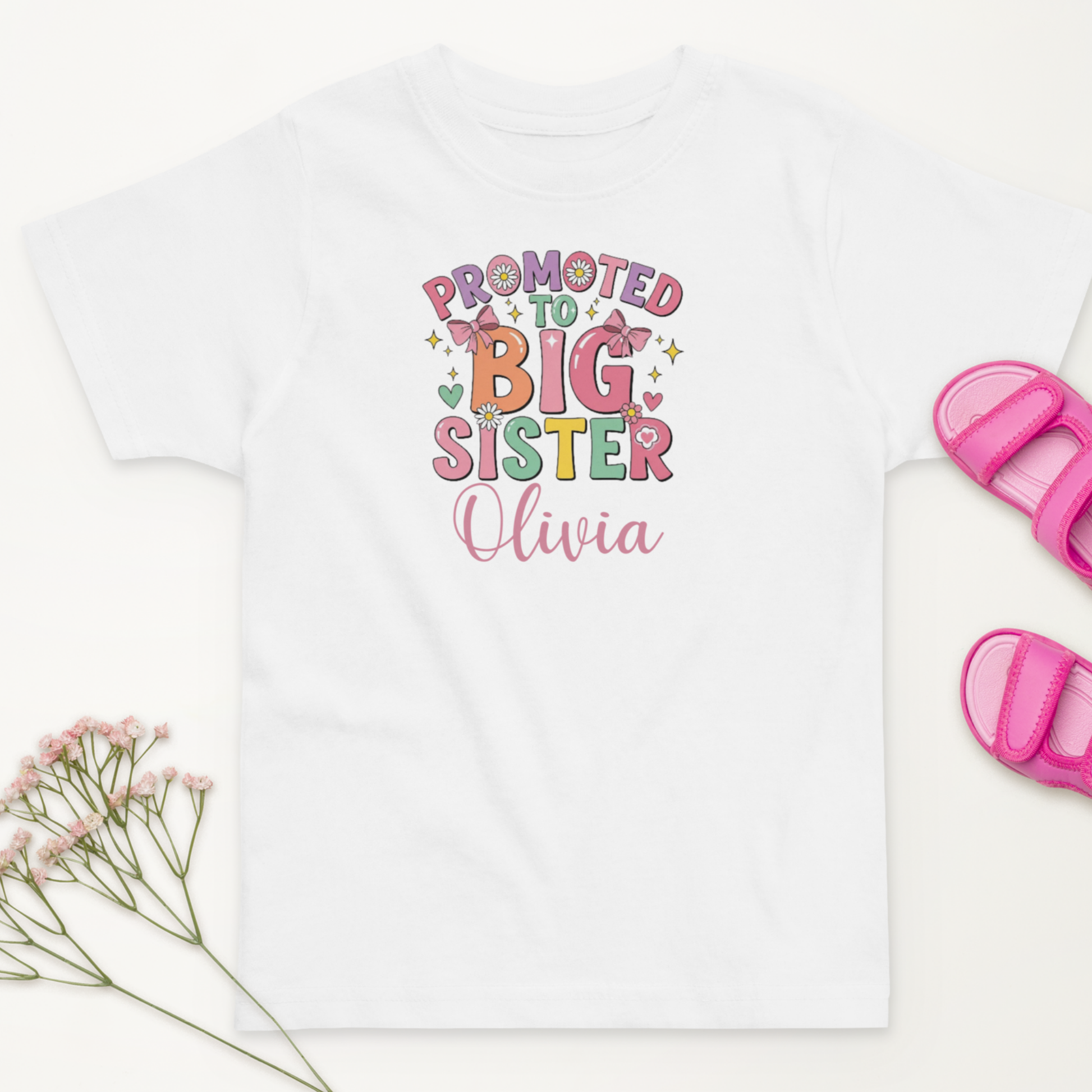 Celebrate your little one’s new role with this personalised “Promoted to Big Sister” t-shirt. Customise it with her name for the perfect sibling announcement or gift!