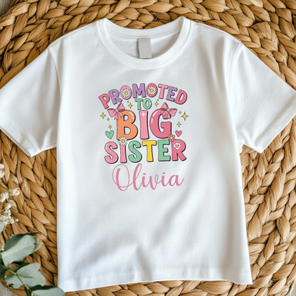 Personalised “Promoted to Big Sister” shirt – a heartfelt way to celebrate your growing family. Available in multiple sizes and colours.

