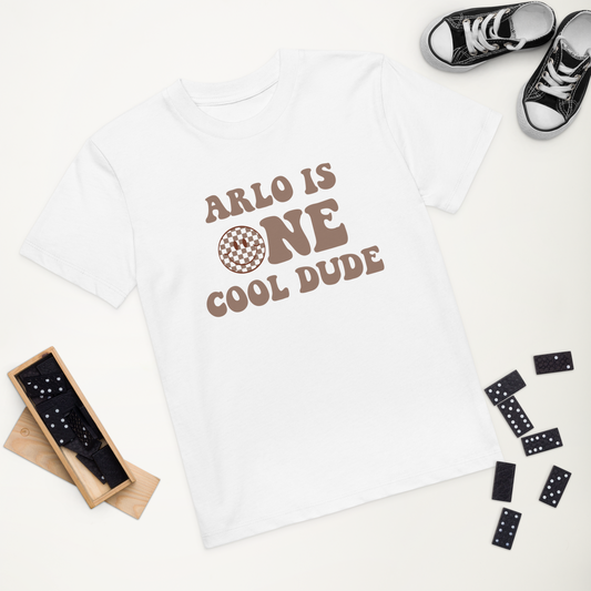 1st birthday T-shirt for boys with personalised name and smiley graphic