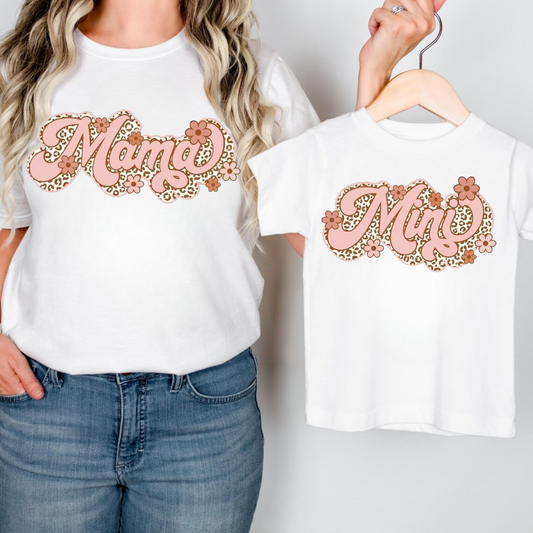 Mommy and toddler outfit with leopard print graphic and matching wording

