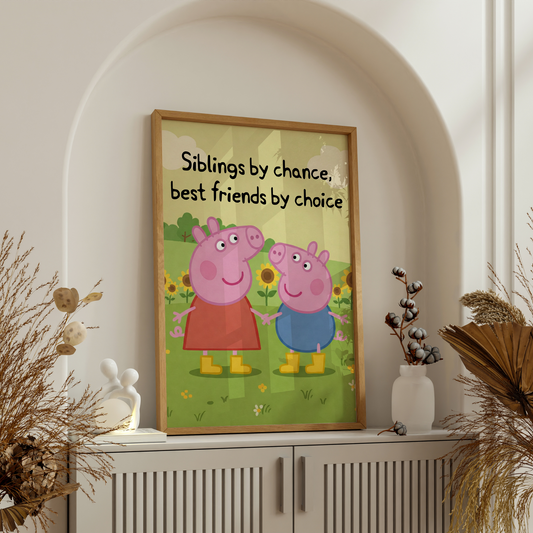 Unframed Peppa Pig and George sibling print placed on white surface with pastel nursery props